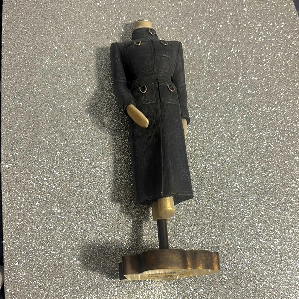 Stylish Black Trench Coat Figurine